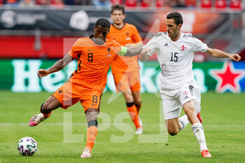 2021-06-06 - Georginio Wijnaldum of the Netherlands and Giogi Aburjania of Georgia during the International Friendly football match between Netherlands and Georgia on June 6, 2021 at FC Twente Stadion in Enschede, Netherlands - Photo Andre Weening / Orange Pictures / DPPI - 2021 FRIENDLY GAME - NETHERLANDS VS GEORGIA - FRIENDLY MATCH - SOCCER