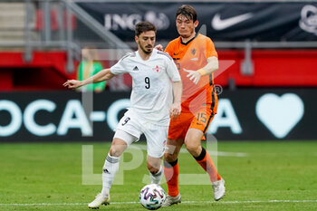 2021-06-06 - Otar Kiteishvili of Georgia and Marten de Roon of the Netherlands during the International Friendly football match between Netherlands and Georgia on June 6, 2021 at FC Twente Stadion in Enschede, Netherlands - Photo Andre Weening / Orange Pictures / DPPI - 2021 FRIENDLY GAME - NETHERLANDS VS GEORGIA - FRIENDLY MATCH - SOCCER