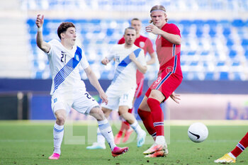 2021-06-06 - Erling Haaland of Norway and Konstantinos Tsimikas of Greece during the international friendly football match between Norway and Greece on June 6, 2021 at La Rosaleda Stadium in Malaga, Spain - Photo Joaquin Corchero / Spain DPPI / DPPI - 2021 FRIENDLY GAME - NORWAY VS GREECE - FRIENDLY MATCH - SOCCER