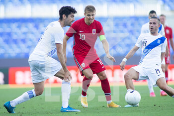 2021-06-06 - Martin Odegaard of Norway and Andreas Bouchalakis, Dimitris Pelkas of Greece during the international friendly football match between Norway and Greece on June 6, 2021 at La Rosaleda Stadium in Malaga, Spain - Photo Joaquin Corchero / Spain DPPI / DPPI - 2021 FRIENDLY GAME - NORWAY VS GREECE - FRIENDLY MATCH - SOCCER