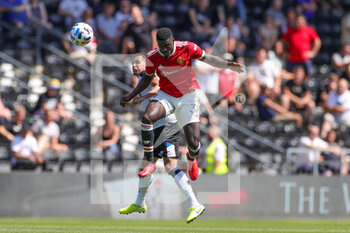 2021-07-18 - Alex Tuanzebe (38) of Manchester United heads the ball during the Pre-Season Friendly football match between Derby County and Manchester United on July 18, 2021 at the Pride Park in Derby, England - Photo Nigel Keene / ProSportsImages / DPPI - FRIENDLY MATCH BETWEEN DERBY COUNTY AND MANCHESTER UNITED  - FRIENDLY MATCH - SOCCER