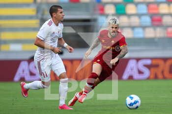 2021-07-25 - Carles Perez of Roma (R) vies for the ball with Janos Ferenczi of Debrecen (L) during the Friendly Pre-Season football match between AS Roma and Debrecen on July 25, 2021 at Stadio Benito Stirpe in Frosinone, Italy - Photo Federico Proietti / DPPI - FRIENDLY PRE-SEASON - AS ROMA AND DEBRECEN - FRIENDLY MATCH - SOCCER