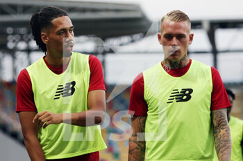 2021-07-25 - Chris Smalling (L) and Rick Karsdorp (R) of Roma talk each other during warm up during the Friendly Pre-Season football match between AS Roma and Debrecen on July 25, 2021 at Stadio Benito Stirpe in Frosinone, Italy - Photo Federico Proietti / DPPI - FRIENDLY PRE-SEASON - AS ROMA AND DEBRECEN - FRIENDLY MATCH - SOCCER