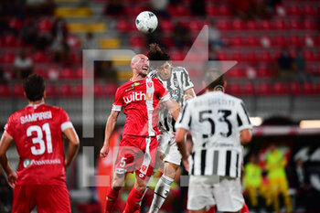 2021-07-31 - Luca Caldirola of Ac Monza and Filippo Ranocchia of Juventus Turin battle for the ball during pre season match valid for 25th Luigi Berlusconi Trophy in U-Power Stadium in Monza, Monza e Brianza, Italy - TROFEO LUIGI BERLUSCONI - MONZA VS JUVENTUS - FRIENDLY MATCH - SOCCER
