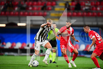2021-07-31 - Mathijs De Ligt of Juventus Turin and Pedro Pereira of Ac Monza battle for the ball during pre season match valid for 25th Luigi Berlusconi Trophy in U-Power Stadium in Monza, Monza e Brianza, Italy - TROFEO LUIGI BERLUSCONI - MONZA VS JUVENTUS - FRIENDLY MATCH - SOCCER