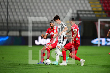 2021-07-31 - Matias Soule' of Juventus Turin, Mattia Valoti of Ac Monza and \Pedro Pereira of Ac Monza battle for the ball during pre season match valid for 25th Luigi Berlusconi Trophy in U-Power Stadium in Monza, Monza e Brianza, Italy - TROFEO LUIGI BERLUSCONI - MONZA VS JUVENTUS - FRIENDLY MATCH - SOCCER
