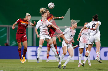 2021-05-30 - Linari (AS Roma) header over Francesca Vitale (AC Milan) and Kaja Erzen (AS Roma) - FINALE - MILAN VS ROMA - WOMEN ITALIAN CUP - SOCCER