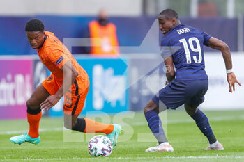 2021-05-31 - Tyrell Malcia of Netherlands U21 battles for possession with Moussa Diaby of France U21 during the 2021 UEFA European Under-21 Championship, Quarter-Finals football match between Netherlands U21 and France U21 on May 31, 2021 at Boszik Arena in Budapest, Hungary - Photo Istvan Derencsenyi / Orange Pictures / DPPI - 2021 UEFA EUROPEAN UNDER-21 CHAMPIONSHIP, QUARTER-FINALS - NETHERLANDS U21 VS FRANCE U21 - UEFA EUROPEAN - SOCCER