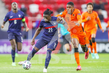 2021-05-31 - Faitout Maouassa of France U21 battles for possession with Myron Boadu of Netherlands U21 during the 2021 UEFA European Under-21 Championship, Quarter-Finals football match between Netherlands U21 and France U21 on May 31, 2021 at Boszik Arena in Budapest, Hungary - Photo Istvan Derencsenyi / Orange Pictures / DPPI - 2021 UEFA EUROPEAN UNDER-21 CHAMPIONSHIP, QUARTER-FINALS - NETHERLANDS U21 VS FRANCE U21 - UEFA EUROPEAN - SOCCER