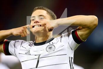2021-06-03 - Florian Wirtz of Germany U21 celebrates after scoring his sides first goal during the 2021 UEFA European Under-21 Championship, Semi-Finals football match between Netherlands and Germany on June 3, 2021 at MOL Arena Sosto in Szekesfehervar, Hungary - Photo Istvan Derencsenyi / Orange Pictures / DPPI - 2021 UEFA EUROPEAN UNDER-21 CHAMPIONSHIP, SEMI-FINALS FOOTBALL MATCH BETWEEN NETHERLANDS AND GERMANY - UEFA EUROPEAN - SOCCER