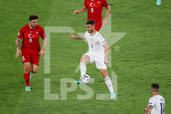 2021-06-11 - Ozan Tufan of Turkey, Leonardo Spinazzola of Italy during the UEFA Euro 2020, Group A, football match between Turkey and Italy on June 11, 2021 at Stadio Olimpico in Rome, Italy - Photo Orange Pictures / DPPI - UEFA EURO 2020, GROUP A, FOOTBALL MATCH - TURKEY VS ITALY - UEFA EUROPEAN - SOCCER