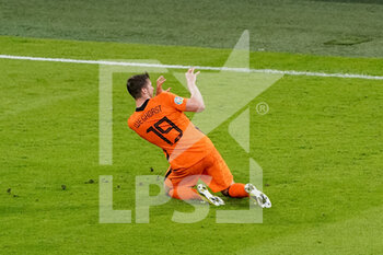 2021-06-14 - Wout Weghorst of the Netherlands celebrates after scoring his sides second goal during the UEFA Euro 2020, Group C football match between Netherlands and Ukraine on June 13, 2021 at the Johan Cruijff ArenA in Amsterdam, Netherlands - Photo Andre Weening / Orange Pictures / DPPI - UEFA EURO 2020, GROUP C FOOTBALL - NETHERLANDS VS UKRAINE - UEFA EUROPEAN - SOCCER