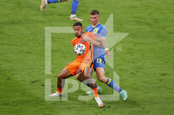 2021-06-14 - Memphis Depay of the Netherlands, Illia Zabarnyi of Ukraine during the UEFA Euro 2020, Group C football match between Netherlands and Ukraine on June 13, 2021 at the Johan Cruijff ArenA in Amsterdam, Netherlands - Photo Marcel ter Bals / Orange Pictures / DPPI - UEFA EURO 2020, GROUP C FOOTBALL - NETHERLANDS VS UKRAINE - UEFA EUROPEAN - SOCCER