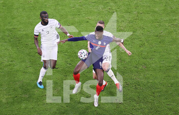 2021-06-15 - Paul Pogba of France, Antonio Rudiger, Robin Gosens of Germany during the UEFA Euro 2020, Group F football match between France and Germany on June 15, 2021 at Allianz Arena in Munich, Germany - Photo Jurgen Fromme / firo sportphoto / DPPI - UEFA EURO 2020, GROUP F - FRANCE VS GERMANY - UEFA EUROPEAN - SOCCER