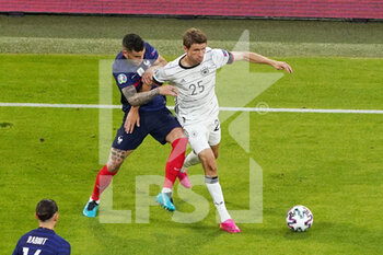 2021-06-15 - Lucas Hernandez of France, Thomas Muller of Germany during the UEFA Euro 2020, Group F football match between France and Germany on June 15, 2021 at Allianz Arena in Munich, Germany - Photo Andre Weening / Orange Pictures / DPPI - UEFA EURO 2020, GROUP F - FRANCE VS GERMANY - UEFA EUROPEAN - SOCCER