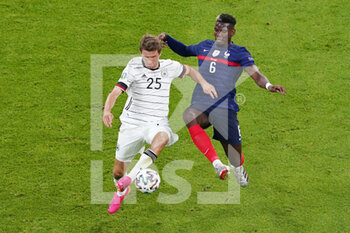 2021-06-15 - Thomas Muller of Germany, Paul Pogba of France during the UEFA Euro 2020, Group F football match between France and Germany on June 15, 2021 at Allianz Arena in Munich, Germany - Photo Andre Weening / Orange Pictures / DPPI - UEFA EURO 2020, GROUP F - FRANCE VS GERMANY - UEFA EUROPEAN - SOCCER