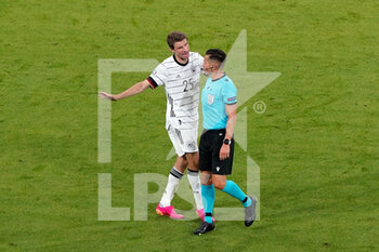 2021-06-15 - Thomas Muller of Germany, Referee Carlos Del Cerro Grande during the UEFA Euro 2020, Group F football match between France and Germany on June 15, 2021 at Allianz Arena in Munich, Germany - Photo Andre Weening / Orange Pictures / DPPI - UEFA EURO 2020, GROUP F - FRANCE VS GERMANY - UEFA EUROPEAN - SOCCER