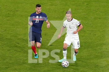 2021-06-15 - Lucas Hernandez of France, Joshua Kimmich of Germany during the UEFA Euro 2020, Group F football match between France and Germany on June 15, 2021 at Allianz Arena in Munich, Germany - Photo Andre Weening / Orange Pictures / DPPI - UEFA EURO 2020, GROUP F - FRANCE VS GERMANY - UEFA EUROPEAN - SOCCER