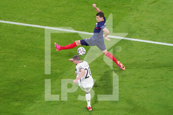 2021-06-15 - Robin Gosens of Germany, Benjamin Pavard of France during the UEFA Euro 2020, Group F football match between France and Germany on June 15, 2021 at Allianz Arena in Munich, Germany - Photo Andre Weening / Orange Pictures / DPPI - UEFA EURO 2020, GROUP F - FRANCE VS GERMANY - UEFA EUROPEAN - SOCCER