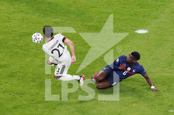 2021-06-15 - Ilkay Gundogan of Germany, Paul Pogba of France during the UEFA Euro 2020, Group F football match between France and Germany on June 15, 2021 at Allianz Arena in Munich, Germany - Photo Andre Weening / Orange Pictures / DPPI - UEFA EURO 2020, GROUP F - FRANCE VS GERMANY - UEFA EUROPEAN - SOCCER