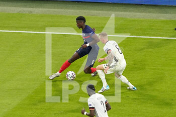 2021-06-15 - Paul Pogba of France, Toni Kroos of Germany during the UEFA Euro 2020, Group F football match between France and Germany on June 15, 2021 at Allianz Arena in Munich, Germany - Photo Andre Weening / Orange Pictures / DPPI - UEFA EURO 2020, GROUP F - FRANCE VS GERMANY - UEFA EUROPEAN - SOCCER