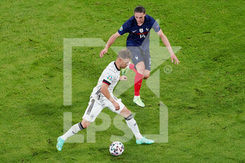 2021-06-15 - Joshua Kimmich of Germany, Adrien Rabiot of France during the UEFA Euro 2020, Group F football match between France and Germany on June 15, 2021 at Allianz Arena in Munich, Germany - Photo Andre Weening / Orange Pictures / DPPI - UEFA EURO 2020, GROUP F - FRANCE VS GERMANY - UEFA EUROPEAN - SOCCER