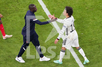 2021-06-15 - Moussa Sissoko of France, Leroy Sane of Germany at the final whistle during the UEFA Euro 2020, Group F football match between France and Germany on June 15, 2021 at Allianz Arena in Munich, Germany - Photo Andre Weening / Orange Pictures / DPPI - UEFA EURO 2020, GROUP F - FRANCE VS GERMANY - UEFA EUROPEAN - SOCCER