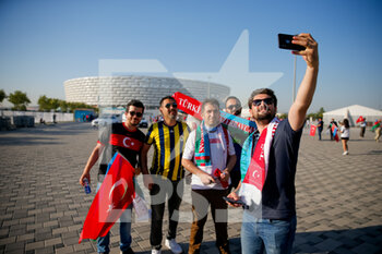 2021-06-16 - Turkish fans pose for a selphie outside Baku Olympic Stadium during the UEFA Euro 2020, Group A football match between Turkey and Wales on June 16, 2021 at Baku Olympic Stadium in Baku, Azerbaijan - Photo Orange Pictures / DPPI - UEFA EURO 2020, GROUP A - TURKEY VS WALES - UEFA EUROPEAN - SOCCER
