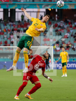 2021-06-16 - Chris Mepham of Wales wins a header from Umut Meras of Turkey during the UEFA Euro 2020, Group A football match between Turkey and Wales on June 16, 2021 at Baku Olympic Stadium in Baku, Azerbaijan - Photo Orange Pictures / DPPI - UEFA EURO 2020, GROUP A - TURKEY VS WALES - UEFA EUROPEAN - SOCCER