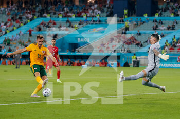 2021-06-16 - Aaron Ramsey of Wales shoots to score his sides first goal past goalkeeper Ugurcan Cak?r of Turkey during the UEFA Euro 2020, Group A football match between Turkey and Wales on June 16, 2021 at Baku Olympic Stadium in Baku, Azerbaijan - Photo Orange Pictures / DPPI - UEFA EURO 2020, GROUP A - TURKEY VS WALES - UEFA EUROPEAN - SOCCER
