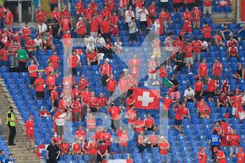 2021-06-16 - Swiss fans in the stands during the UEFA Euro 2020 Group A - Italy vs Switzerland at the Olimpic Stadium in Rome. - UEFA EURO 2020 GROUP A - ITALY VS SWITZERLAND - UEFA EUROPEAN - SOCCER