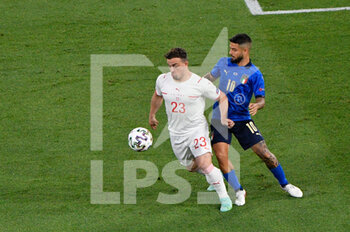 2021-06-16 - Xherdan Shaqiri of Switzerland and Lorenzo Insigne of Italy seen in action during the UEFA Euro 2020 Group A - Italy vs Switzerland at the Olimpic Stadium in Rome. - UEFA EURO 2020 GROUP A - ITALY VS SWITZERLAND - UEFA EUROPEAN - SOCCER