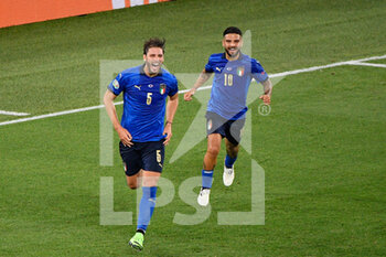 2021-06-16 - Manuel Locatelli of Italy celebrates after scoring goal 1-0 with Lorenzo Insigne of Italy seen in action during the UEFA Euro 2020 Group A - Italy vs Switzerland at the Olimpic Stadium in Rome. - UEFA EURO 2020 GROUP A - ITALY VS SWITZERLAND - UEFA EUROPEAN - SOCCER