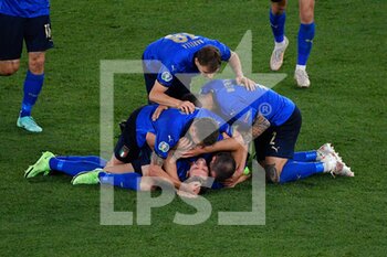 2021-06-16 - Manuel Locatelli of Italy celebrated by his companions after scoring goal 2-0 during the UEFA Euro 2020 Group A - Italy vs Switzerland at the Olimpic Stadium in Rome. - UEFA EURO 2020 GROUP A - ITALY VS SWITZERLAND - UEFA EUROPEAN - SOCCER