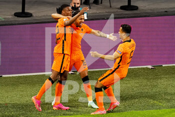 2021-06-17 - Denzel Dumfries of the Netherlands celebrates with Donyell Malen of the Netherlands and Owen Wijndal of the Netherlands after scoring his sides second goal during the UEFA Euro 2020, Group C football match between Netherlands and Austria on June 17, 2021 at the Johan Cruijff ArenA in Amsterdam, Netherlands - Photo Andre Weening / Orange Pictures / DPPI - UEFA EURO 2020, GROUP C - NETHERLANDS VS AUSTRIA - UEFA EUROPEAN - SOCCER
