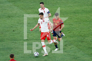 2021-06-19 - Jakub Moder of Poland and Pedro Gonzalez "Pedri" of Spain during the UEFA Euro 2020, Group E football match between Spain and Poland on June 19, 2021 at La Cartuja stadium in Seville, Spain - Photo Joaquin Corchero / Spain DPPI / DPPI - UEFA EURO 2020, GROUP E - SPAIN VS POLAND - UEFA EUROPEAN - SOCCER