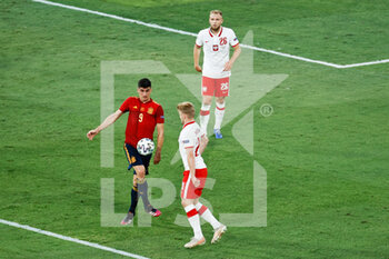 2021-06-19 - Tymoteusz Puchacz of Poland and Gerard Moreno of Spain during the UEFA Euro 2020, Group E football match between Spain and Poland on June 19, 2021 at La Cartuja stadium in Seville, Spain - Photo Joaquin Corchero / Spain DPPI / DPPI - UEFA EURO 2020, GROUP E - SPAIN VS POLAND - UEFA EUROPEAN - SOCCER