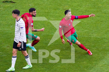 2021-06-19 - Cristiano Ronaldo of Portugal celebrates after scoring his sides first goal during the UEFA Euro 2020, Group F football match between Portugal and Germany on June 19, 2021 at Allianz Arena in Munich, Germany - Photo Andre Weening / Orange Pictures / DPPI - UEFA EURO 2020, GROUP F - PORTUGAL VS GERMANY - UEFA EUROPEAN - SOCCER