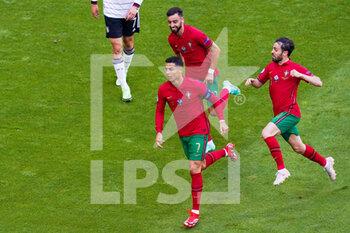 2021-06-19 - Cristiano Ronaldo of Portugal celebrates after scoring his sides first goal during the UEFA Euro 2020, Group F football match between Portugal and Germany on June 19, 2021 at Allianz Arena in Munich, Germany - Photo Andre Weening / Orange Pictures / DPPI - UEFA EURO 2020, GROUP F - PORTUGAL VS GERMANY - UEFA EUROPEAN - SOCCER
