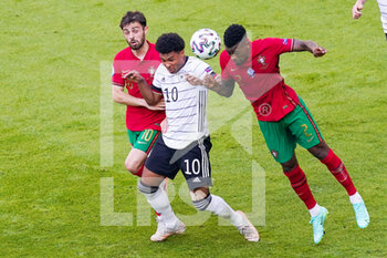 2021-06-19 - Serge Gnabry of Germany battles for possession with Nelson Semedo of Portugal and Bernardo Silva of Portugal during the UEFA Euro 2020, Group F football match between Portugal and Germany on June 19, 2021 at Allianz Arena in Munich, Germany - Photo Andre Weening / Orange Pictures / DPPI - UEFA EURO 2020, GROUP F - PORTUGAL VS GERMANY - UEFA EUROPEAN - SOCCER