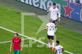 2021-06-19 - Kai Havertz of Germany celebrates after scoring his sides first goal with Thomas Muller during the UEFA Euro 2020, Group F football match between Portugal and Germany on June 19, 2021 at Allianz Arena in Munich, Germany - Photo Andre Weening / Orange Pictures / DPPI - UEFA EURO 2020, GROUP F - PORTUGAL VS GERMANY - UEFA EUROPEAN - SOCCER