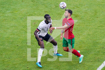 2021-06-19 - Antonio Rudiger of Germany and Bruno Fernandes of Portugal during the UEFA Euro 2020, Group F football match between Portugal and Germany on June 19, 2021 at Allianz Arena in Munich, Germany - Photo Andre Weening / Orange Pictures / DPPI - UEFA EURO 2020, GROUP F - PORTUGAL VS GERMANY - UEFA EUROPEAN - SOCCER