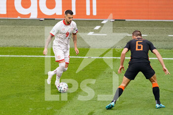2021-06-21 - Aleksandar Trajkovski of North Macedonia and Stefan de Vrij of the Netherlands during the UEFA Euro 2020, Group C football match between North Macedonia and Netherlands on June 21, 2021 at the Johan Cruijff ArenA in Amsterdam, Netherlands - Photo Andre Weening / Orange Pictures / DPPI - UEFA EURO 2020, GROUP C - NORTH MACEDONIA VS NETHERLANDS - UEFA EUROPEAN - SOCCER