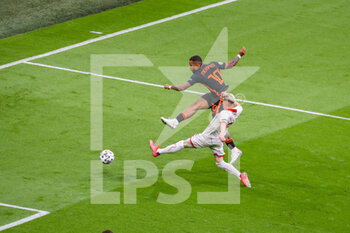 2021-06-21 - Ezgjan Alioski of North Macedonia, Memphis Depay of the Netherlands during the UEFA Euro 2020, Group C football match between North Macedonia and Netherlands on June 21, 2021 at the Johan Cruijff ArenA in Amsterdam, Netherlands - Photo Marcel ter Bals / Orange Pictures / DPPI - UEFA EURO 2020, GROUP C - NORTH MACEDONIA VS NETHERLANDS - UEFA EUROPEAN - SOCCER