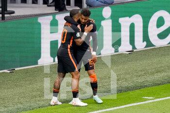 2021-06-21 - Memphis Depay of the Netherlands celebrates with Donyell Malen of the Netherlands after scoring his sides first goal during the UEFA Euro 2020, Group C football match between North Macedonia and Netherlands on June 21, 2021 at the Johan Cruijff ArenA in Amsterdam, Netherlands - Photo Andre Weening / Orange Pictures / DPPI - UEFA EURO 2020, GROUP C - NORTH MACEDONIA VS NETHERLANDS - UEFA EUROPEAN - SOCCER