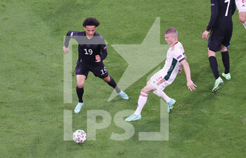 2021-06-23 - Leroy Sane of Germany and Andras Schafer of Hungary during the UEFA Euro 2020, Group F football match between Germany and Hungary on June 23, 2021 at Allianz Arena in Munich, Germany - Photo Jurgen Fromme / firo Sportphoto / DPPI - UEFA EURO 2020, GROUP F - GERMANY AND HUNGARY - UEFA EUROPEAN - SOCCER
