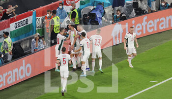 2021-06-23 - Adam Szalai of Hungary celebrates after his goal with teammates during the UEFA Euro 2020, Group F football match between Germany and Hungary on June 23, 2021 at Allianz Arena in Munich, Germany - Photo Jurgen Fromme / firo Sportphoto / DPPI - UEFA EURO 2020, GROUP F - GERMANY AND HUNGARY - UEFA EUROPEAN - SOCCER