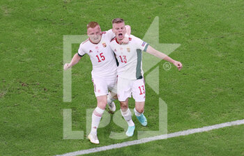 2021-06-23 - Andras Schafer of Hungary celebrates his goal 1-2 with Laszlo Kleinheisler during the UEFA Euro 2020, Group F football match between Germany and Hungary on June 23, 2021 at Allianz Arena in Munich, Germany - Photo Jurgen Fromme / firo Sportphoto / DPPI - UEFA EURO 2020, GROUP F - GERMANY AND HUNGARY - UEFA EUROPEAN - SOCCER