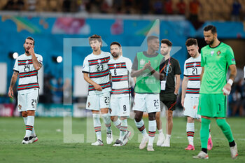 2021-06-27 - Players of Portugal dejected at the final whistle during the UEFA EURO 2020, Round of 16 football match between Belgium and Portugal on June 27, 2021 at La Cartuja stadium in Seville, Spain - Photo Joaquin Corchero / Spain DPPI / DPPI - UEFA EURO 2020, ROUND OF 16 - BELGIUM VS PORTUGAL - UEFA EUROPEAN - SOCCER
