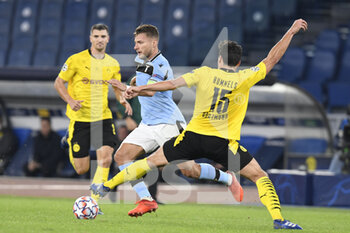 2020-10-20 -  ROME, ITALY - October 20 : Ciro Immobile ( L) of SS Lazio in action against Mats Hummels (R ) of Borussia Dortmund during the UEFA Champions League group f  soccer match between SS Lazio and Borussia Dortmund Stadio Olimpico on October 20,2020 in Rome Italy - SS LAZIO VS BORUSSIA DORTMUND - UEFA CHAMPIONS LEAGUE - SOCCER